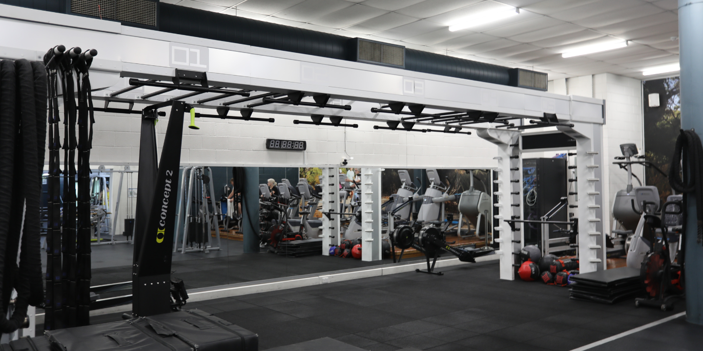 A photo of a Queenax machine within the venue gym